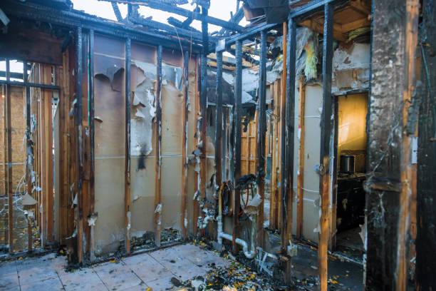 Professional Fire Damage Repair technician working in Rogers, TX